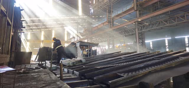 Crew under light shafts
