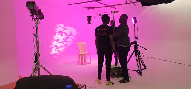 Crew silhouettes on cyc