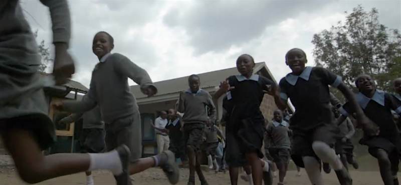Documentary still &mdash; schoolchildren running